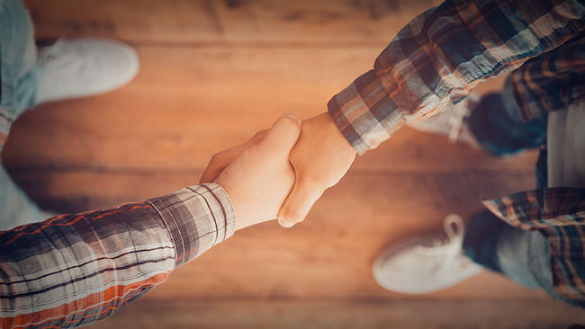 A hearty handshake or a big warm hug? What greeting do you prefer when out networking?